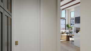 Hallway with beamed ceiling and light wood-type flooring