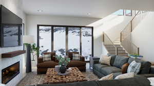 Living room featuring a tiled fireplace and a wealth of natural light