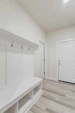 Mudroom featuring light hardwood / wood-style flooring