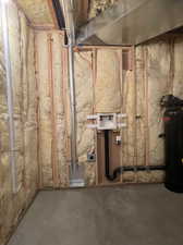 View of basement utility room with laundry hookups