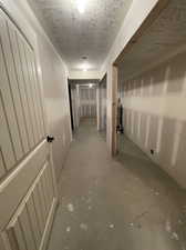 Hallway, storage closet and additional storage room.  Drywall is complete.  Ready for finish work, paint & flooring.