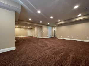 Family room featuring dark carpet