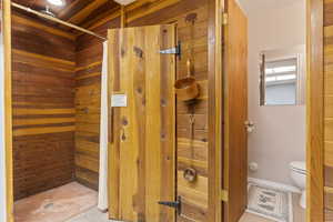 Bathroom with tile flooring and toilet