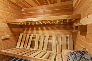 View of sauna with wood walls