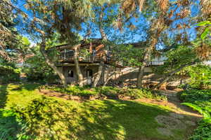 View of yard with a deck