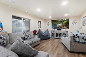 Living room featuring wood-type flooring