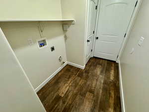 Washroom featuring gas dryer hookup, dark hardwood / wood-style floors, hookup for an electric dryer, and washer hookup