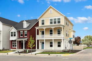 View of front of home with a balcony