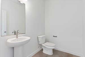 Bathroom with tile floors and toilet