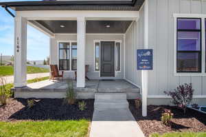 Doorway to property with a porch