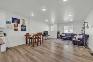 Living room with hardwood / wood-style floors