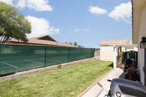 View of yard with a patio area