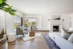 Living room with hardwood / wood-style floors