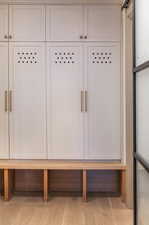 Mudroom featuring light wood-type flooring