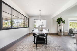 Dining room featuring hardwood / wood-style floors and a wealth of natural light