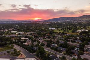 Aerial view at dusk with a mountain view