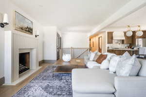 Living room with light parquet floors