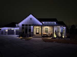 View of front of property featuring a garage