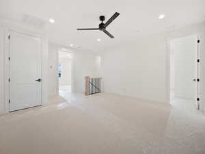 Unfurnished room featuring ceiling fan