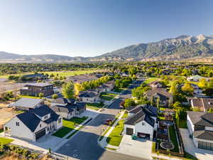 Birds eye view of property with a mountain view