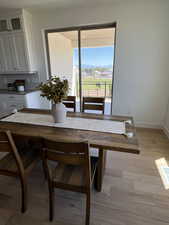 Dining space featuring light hardwood / wood-style floors