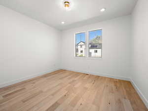 Unfurnished room or office featuring light wood-type flooring