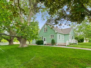 Exterior space featuring a front lawn