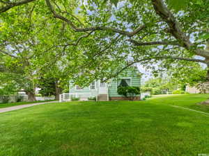 View of front of house with a front lawn