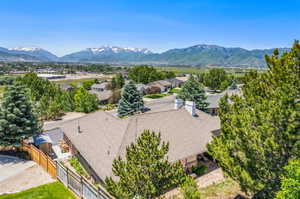 Birds eye view of property with a mountain view