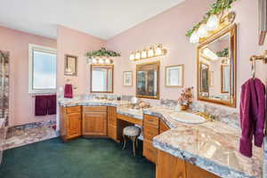 Bathroom featuring double sink vanity