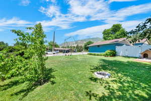 View of yard featuring a playground