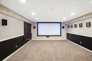 Home theater with carpet flooring