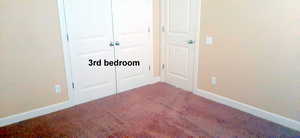 3rd bedroom at the other end of the private hallway.