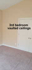 All bedrooms have vaulted ceilings.