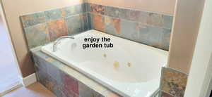 Relax and enjoy the over sized garden tub.