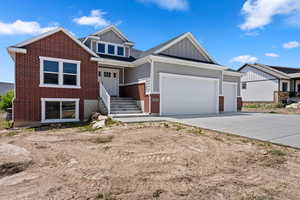 View of front of property featuring a garage