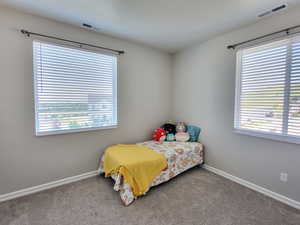 View of carpeted bedroom