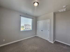 View of carpeted spare room