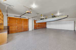 Main Garage. Extra long, extra wide 3 car garage with built in cabinets.