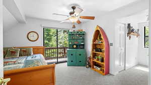 Bedroom with carpet, a closet, ceiling fan, and access to outside