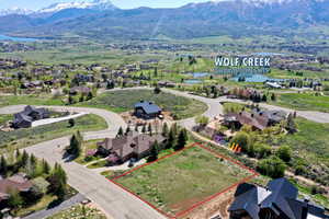 Bird's eye view featuring a water and mountain view