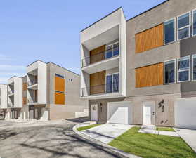 View of building exterior with a garage