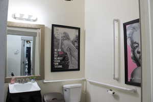 Bathroom featuring toilet and vanity