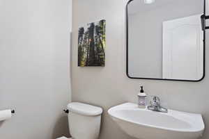 Bathroom with sink and toilet