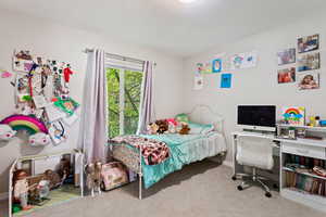 Bedroom featuring carpet