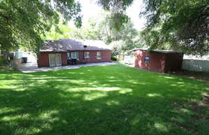 View of yard with a patio area