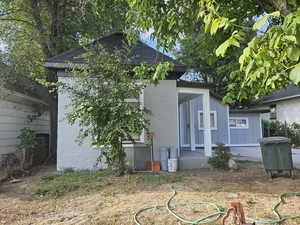 Back of property featuring central AC unit