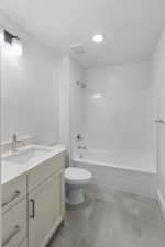 Full bathroom with vanity, toilet, bathing tub / shower combination, and tile patterned floors