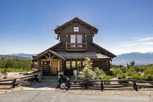 View of front of property featuring a mountain view