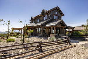 View of front of house with covered porch